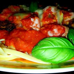 A picture of Mike's Crispy Chicken Parmesan & Fettucini.