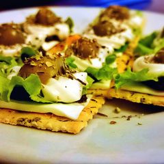 A picture of Olive salad crackers.