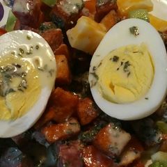 A picture of Meat, Cheese, Tomato, and Herb Salad.