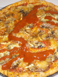 Una foto de Pizza de longaniza Halloween