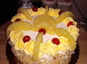 Una foto de Torta de piña y coco