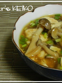 A picture of Simmered Crumbled Tofu and Shimeji Mushrooms.