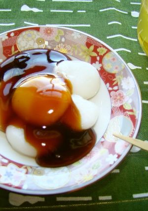 A picture of Delicious Mitarashi Dango With Thick Sauce.