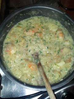 A picture of shrimp açorda (bread puré).
