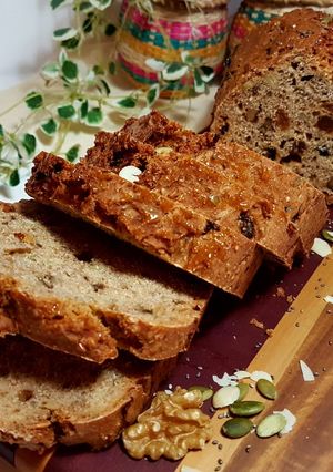 Una foto de Pan centeno integral con nueces+almendras+chía+arándanos y pasas!!!