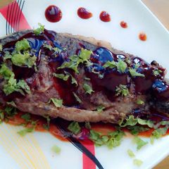 A picture of "Sweet Steamed Tilapia (cichlid fish) with Sweet and Sour Sauce".