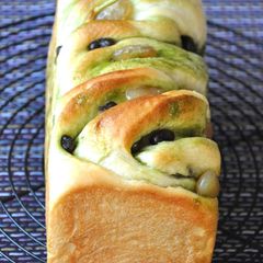 A picture of Twisted Soy Milk Bread with Amanatto (Candied Beans) and Green Tea.