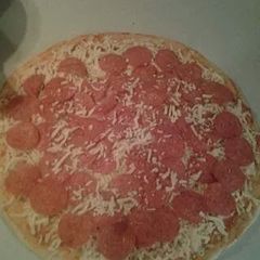 A picture of Delicious Home Made Pizza.