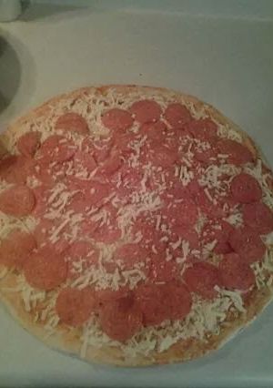 A picture of Delicious Home Made Pizza.