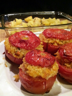 A picture of AMIEs TOMATOES STUFFED with BASIL-FLAVORED rice.
