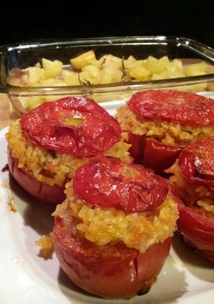 A picture of AMIEs TOMATOES STUFFED with BASIL-FLAVORED rice.