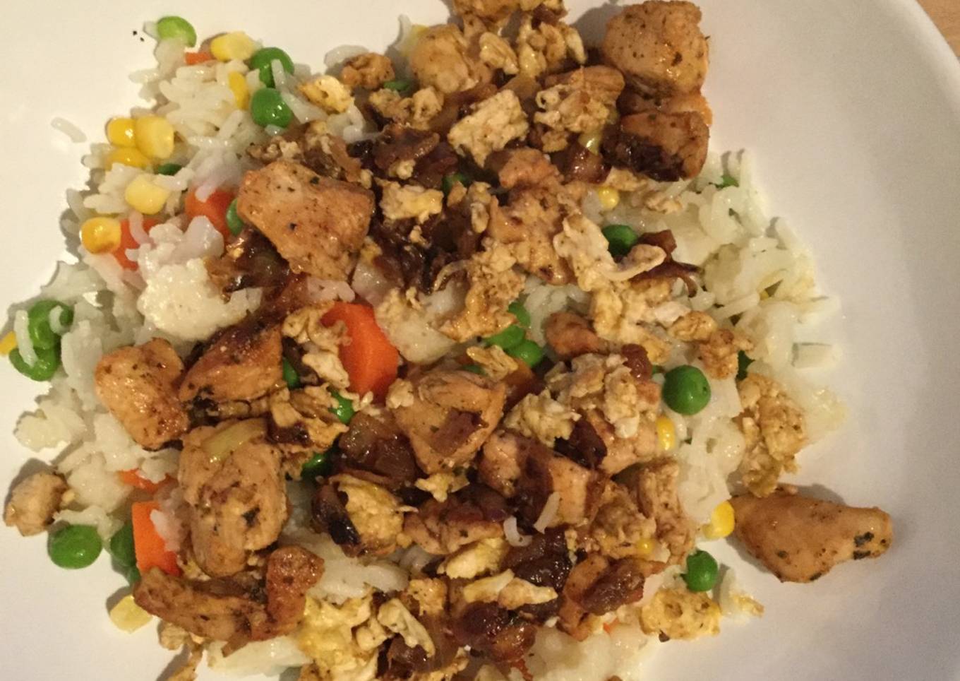 Fried chicken and rice with vegetables - Chinese cuisine influence 