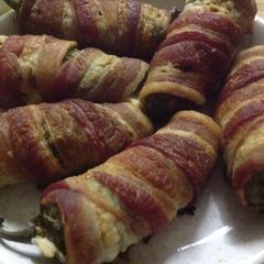 Jalapenos wrapped in bacon A picture of Jalapenos wrapped in bacon.