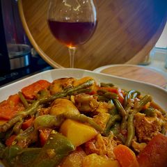 A picture of Chicken Drumsticks and Breasts Stew with Green Beans, Potatoes, Carrots, and Bell Pepper.