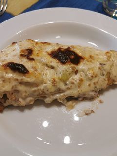 Una foto de Bruixa amb salsa de pinya i ametlles