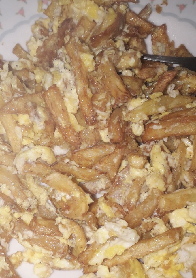 Una foto de Papas con huevos