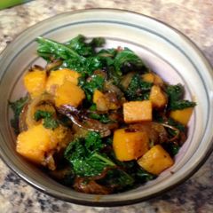A picture of Kale with Squash And Onion.