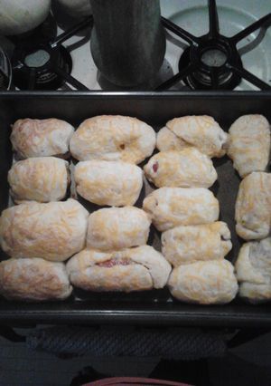 A picture of Easy cheesy pigs in a blanket.