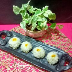 A picture of Kadam Phool Bhapa Pitha.