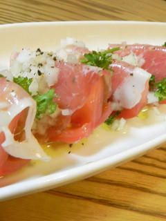 A picture of Chilled Marinated Salad with Tomato and Prosciutto.