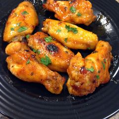 A picture of Sriracha glazed wings.
