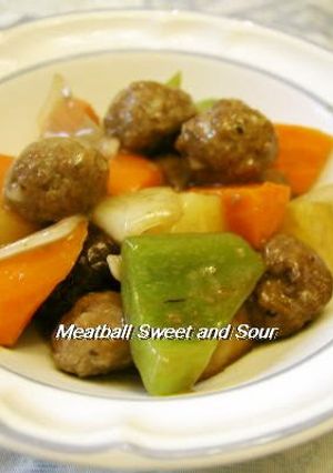 A picture of Sweet and Sour Pork Style Meatballs with Thick Sweet-Vinegar Sauce.