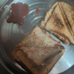 Curd onion tomato sandwich A picture of Curd onion tomato sandwich.