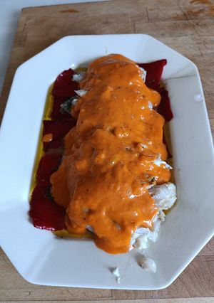 Una foto de Lomos de Bacalao con Pimientos del Piquillo Confitados