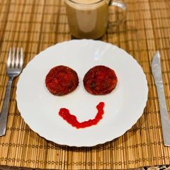 A picture of Beetroot and vegetables cutlets.