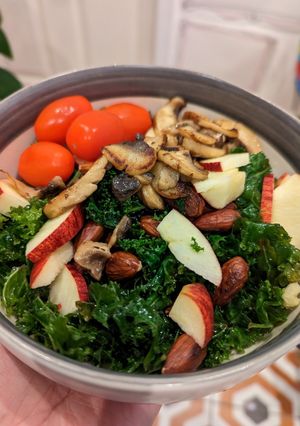 A picture of Kale, mushroom & almonds salad for quick lunch.