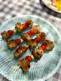 Brochetas de solomillo de cerdo con verduras