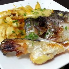 A picture of Salmon And Potato Top Hollandaise Sauce With Orange Zest And Dill.