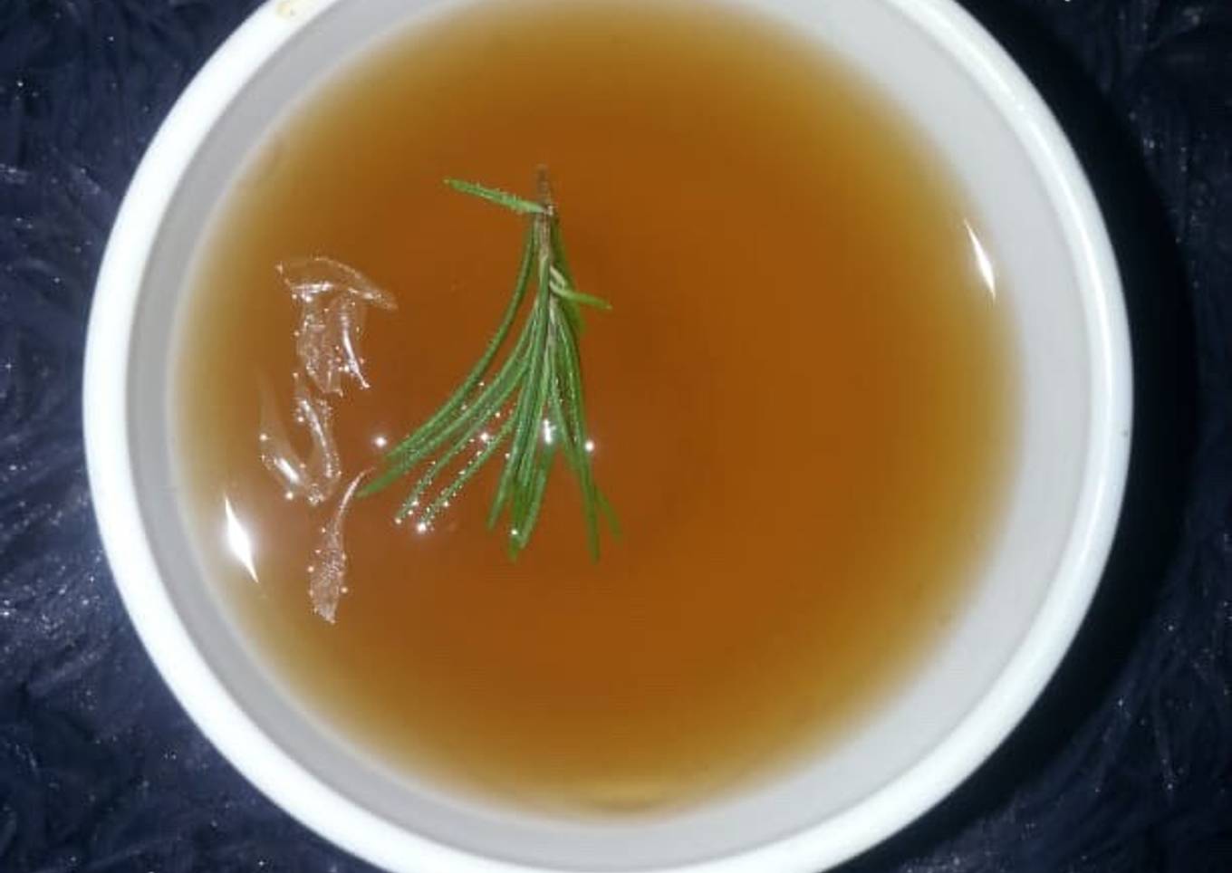 Strong tea with lemon and rosemary