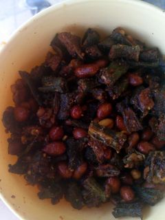 A picture of crispy fried okra with peanuts.