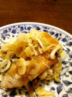 A picture of Fried Yellowtail with Green Onions and Ponzu Sauce.