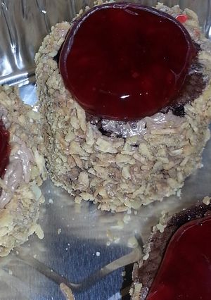 A picture of Luscious Brownie Cream Cake with Nut Crunch.