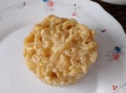 Una foto de fideos con queso cheddar