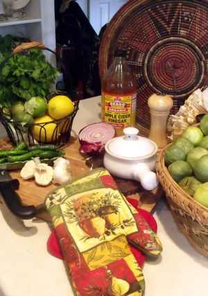 A picture of Tomatilla Salsa and Apples.