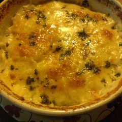 A picture of Scalloped Potatoes with Cheddar Cheese.