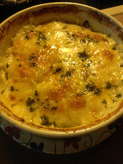 A picture of Scalloped Potatoes with Cheddar Cheese.