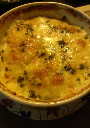 A picture of Scalloped Potatoes with Cheddar Cheese.