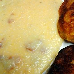 A picture of Grits bacon and cheese.