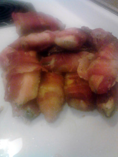 A picture of Maple bacon wrapped, cream cheese stuffed jalapenos.