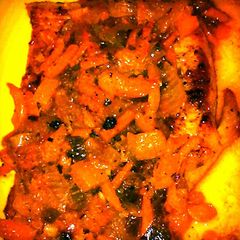 A picture of pork chops and Dijon sauce.