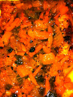 A picture of pork chops and Dijon sauce.