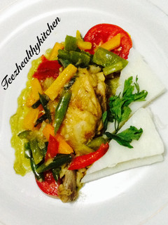 A picture of Yam and chicken coconut sauce.