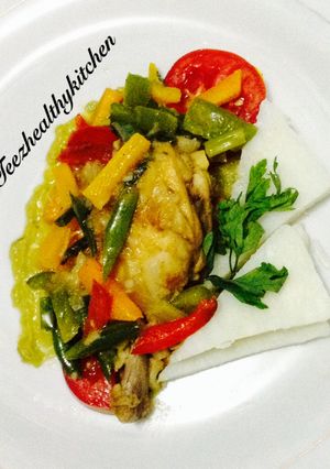 A picture of Yam and chicken coconut sauce.