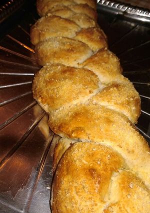 Una foto de Pan trenzado de queso y ajo