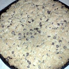 A picture of giant choc chip cookie.