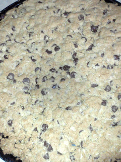 A picture of giant choc chip cookie.